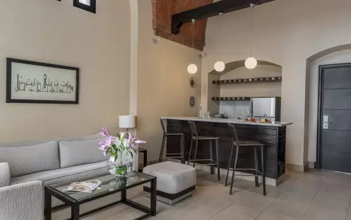 middle-east-holidays-ras-al-khaimah-the-cove-rotana-resort-garden view-two-bedroom-villa-livingroom-and-kitchenette